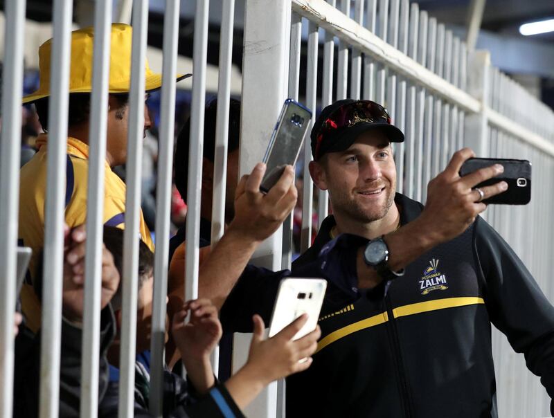 Sharjah, United Arab Emirates - February 21, 2019: Peshawar's Dawid Malan has pics taken with the fans after his call up into the England T20 squad for the West Indies tour during the game between Peshawar Zalmi and Karachi Kings in the Pakistan Super League. Thursday the 21st of February 2019 at Sharjah Cricket Stadium, Sharjah. Chris Whiteoak / The National