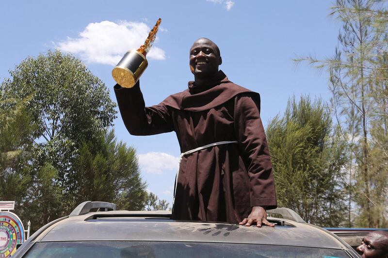 Peter Mokaya Tabichi a Kenyan science teacher and Franciscan friar at the Keriko Mixed Day Secondary School in Pwani Village of Njoro,  Nakuru County,  located 185 km from the capital city of Nairobi in Kenya arrives at the school on the 30th March 2019 during his home coming reception.  Tabichi won the Global teacher award last week. Photo/Fredrick Omondi/Kenya