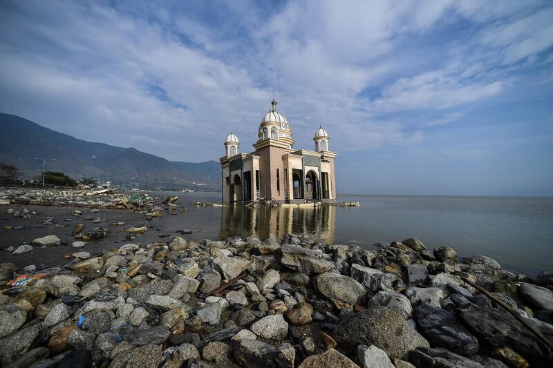 A damaged mosque is seen by the tsunami-devastated coast in Palu, Indonesia's Central Sulawesi. Mohd Rasfan/AFP