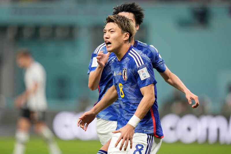 Japan's Ritsu Doan celebrates after scoring his side's opening goal. AP