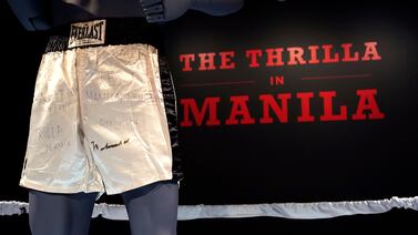 Muhammad Ali’s trunks worn during the 1975 boxing bout against Joe Frazier dubbed ‘The Thrilla in Manila’ are on display during 'Sports Week' auctions at Sotheby's in New York City on April 4, 2024. AFP