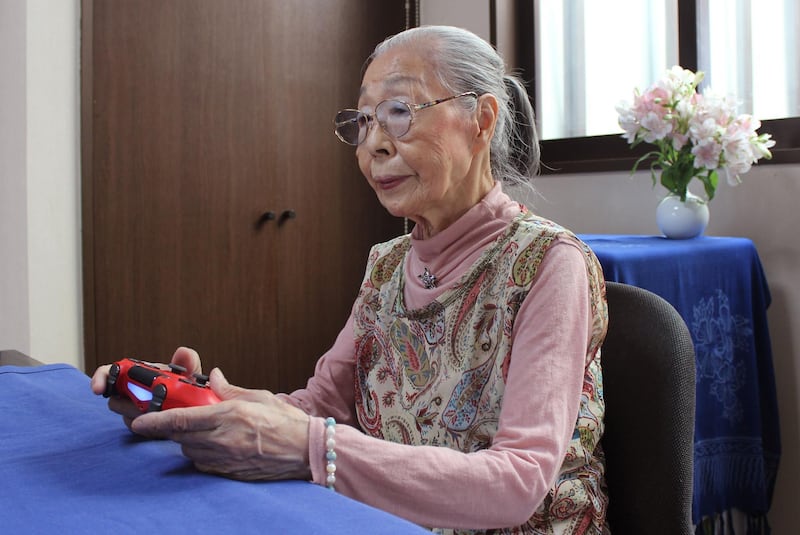 This handout photo taken on May 29, 2020 and received on May 31 courtesy of Keisuke Nagao shows 90-Year-old Hamako Mori, dubbed Japan's "Gamer Grandma", holding a video game controller in Matsudo, Chiba prefecture. The pensioner known as "Gamer Grandma" spends three or more hours a day battling monsters and going on missions in the virtual worlds of her favourite games, and even has a popular YouTube channel for her fans. - RESTRICTED TO EDITORIAL USE - MANDATORY CREDIT "AFP PHOTO / Courtesy of Keisuke Nagao" - NO MARKETING NO ADVERTISING CAMPAIGNS - DISTRIBUTED AS A SERVICE TO CLIENTS --- NO ARCHIVES ---
To go with interview by Shingo ITO
 / AFP / Courtesy of Keisuke Nagao / Handout / RESTRICTED TO EDITORIAL USE - MANDATORY CREDIT "AFP PHOTO / Courtesy of Keisuke Nagao" - NO MARKETING NO ADVERTISING CAMPAIGNS - DISTRIBUTED AS A SERVICE TO CLIENTS --- NO ARCHIVES ---
To go with interview by Shingo ITO
