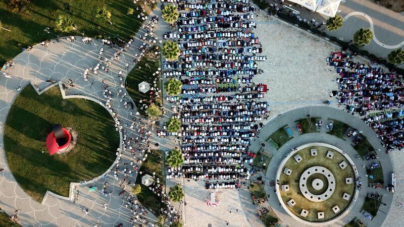 This aerial view shows Albanian Muslims as they pray in the main square of Kavaja to mark the first day of the Eid Al Adha Festival. AFP