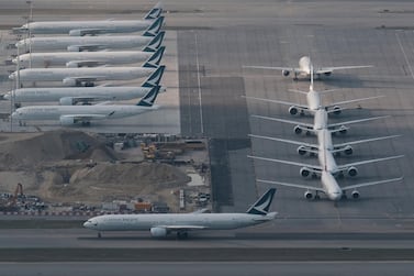 Cathay Pacific aircraft are seen parked on the tarmac at the airport, following the outbreak of the novel coronavirus, in Hong Kong. Reuters. 