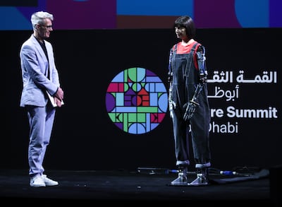 Ai-Da in conversation with Tim Marlow, director of the Design Museum in London, at the Culture Summit Abu Dhabi. Victor Besa / The National