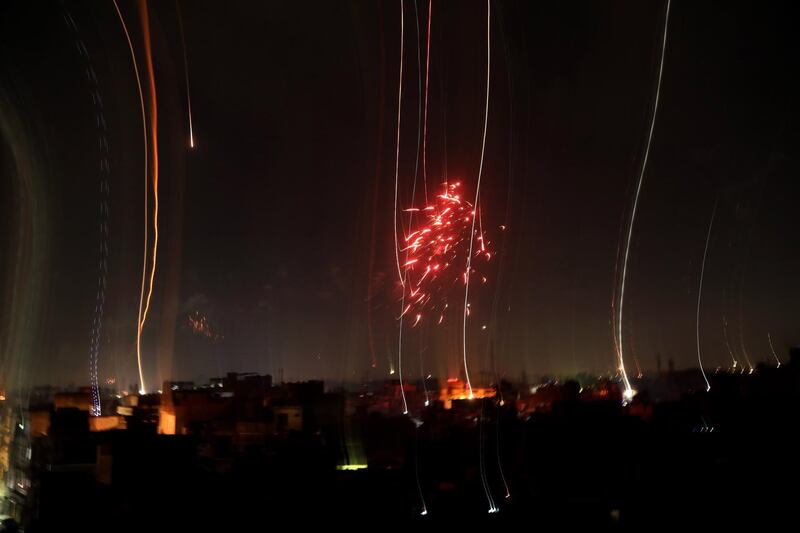 Indian people light fireworks on the occasion of the Diwali festival in Jammu, India. EPA