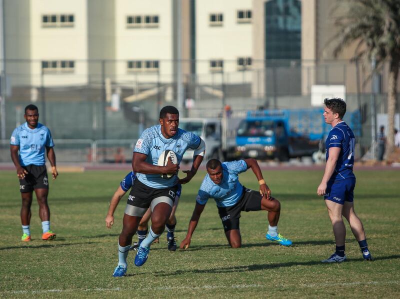November 25, 2017.   Rugby match between Fiji  VS. Jebel Ali Dragons at the Dubai Sports City.  Karlione Nasako of Fiji slips through the Jebel Ali defense and scores.
Victor Besa for The National
Sports
Reporter:  Paul Radley