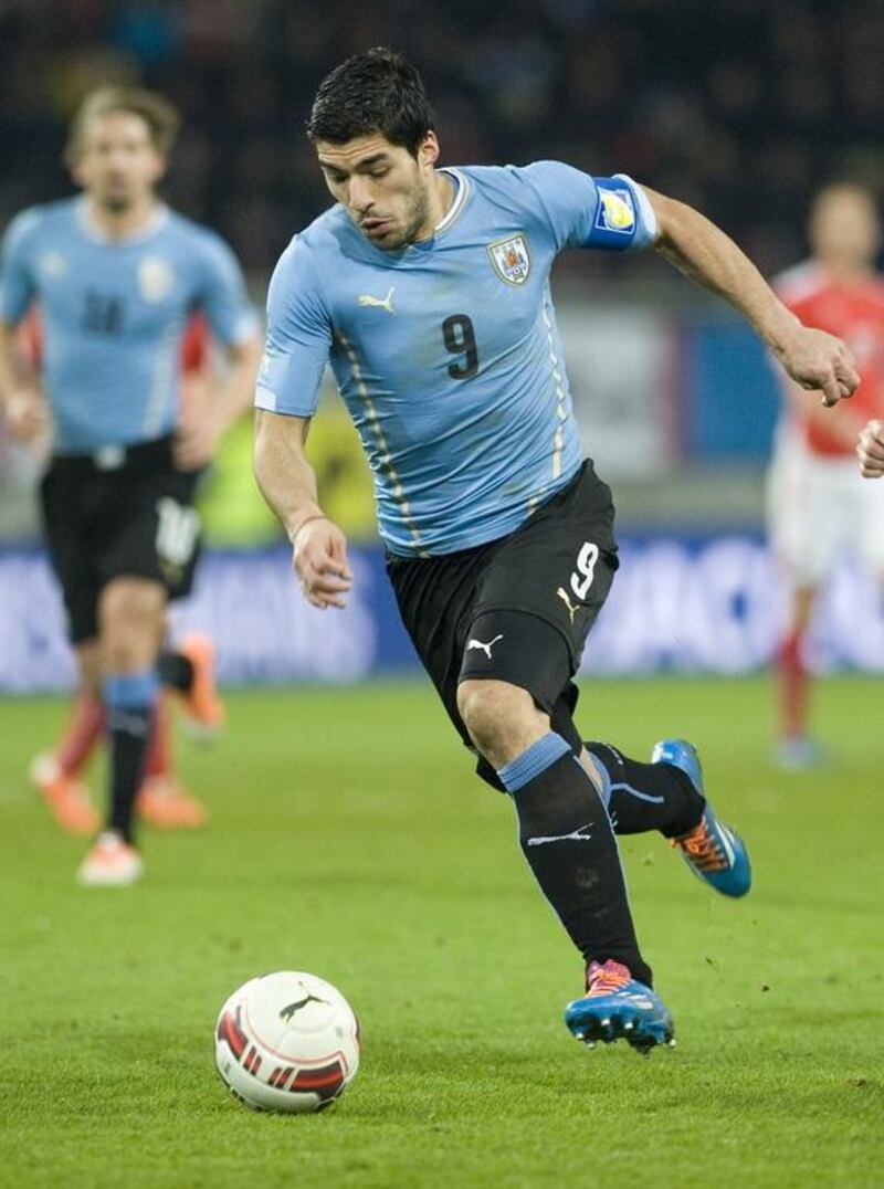 Luis Suarez shown during an international friendly with Uruguay against Austria on March 5, 2014. Winnie Pessentheiner / Getty Images 