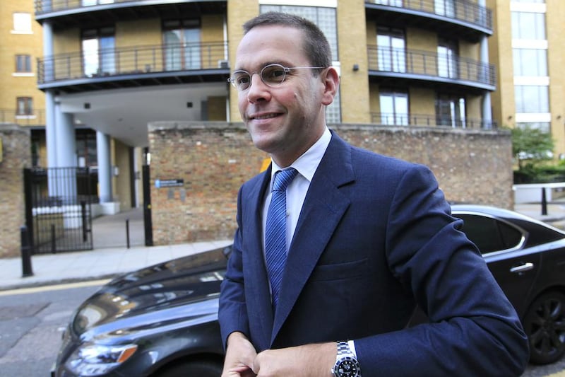 James Murdoch arrives at News International headquarters in London in 2011.  Sang Tan / AP Photo