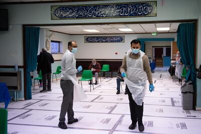 Pharmacists at the Al Abbas Mosque, Birmingham, which is being used as a covid vaccination centre. Picture date: Thursday January 21, 2021. (Photo by Jacob King/PA Images via Getty Images)