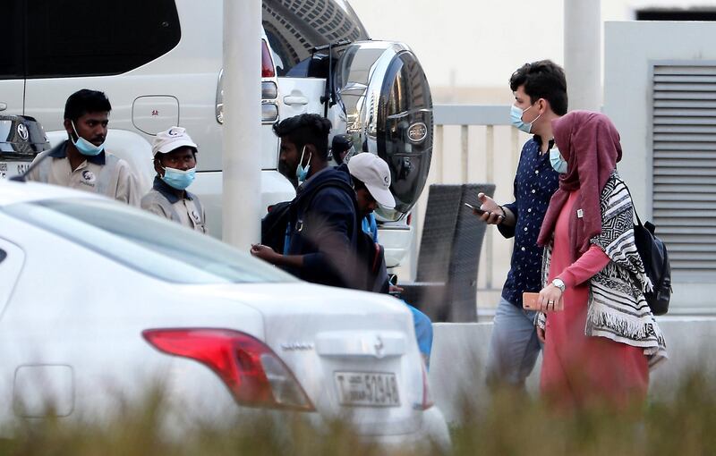 DUBAI, UNITED ARAB EMIRATES , January 3 – 2021 :- People wearing warm clothes during the winter season in Barsha heights area in Dubai. (Pawan Singh / The National) For News/Stock/Online.