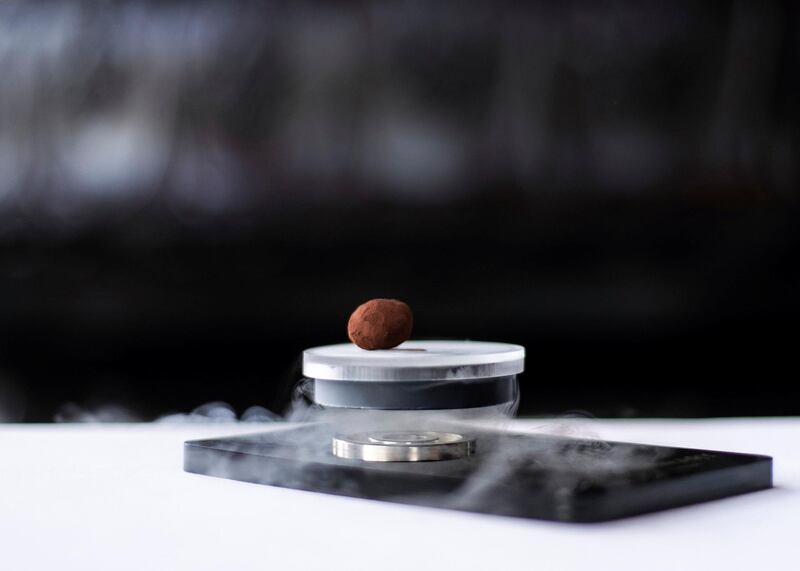 DUBAI, UNITED ARAB EMIRATES. 29 JULY 2019. 

Masala Library in JW Marriot Marquis inroduces ‘The Floating Chocolate’: a chocolate truffle that floats in mid-air using magnets and nitrogen for a levitating show.

(Photo: Reem Mohammed/The National)