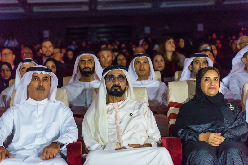 Dubai, UAE. April 20th 2016. Abdul Aziz Al Ghurair, CEO of Mashreq bank, (L), H.E. Sheikh Mohammed Bin Rashid Al Maktoum, Vice President, Prime Minister of the UAE and Ruler of Dubai, (C), and Sheikha Lubna Al Qasimi, the UAE's Minister for Foreign Trade, (R),  sat before a presentation at the launch of the Al Ghurair Foundation, an education fund created by the Al Ghurair Family to offer educational support to young Arabs. The launch was held at Zayed University in Dubai's Academic City.   Alex Atack for The National.  *** Local Caption ***  AA_201416_AlGhurairFoundationLaunch-2.jpg