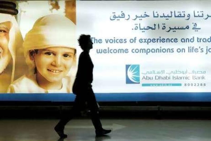 ABU DHABI, UNITED ARAB EMIRATES - July 20, 2009: An advertisment for Abu Dhabi Islamic Bank in Al Wahda Mall, Abu Dhabi. 
( Ryan Carter / The National ) *** Local Caption ***  RC008-ADIslamicBank.JPGBZ22JL ADIB 02.jpg