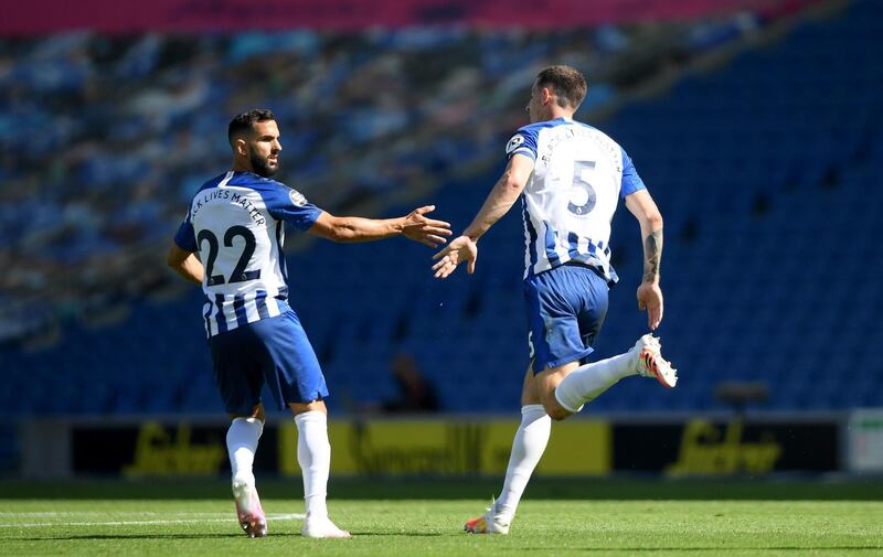 Brighton & Hove Albion's Lewis Dunk celebrates scoring his side's first goal. PA
