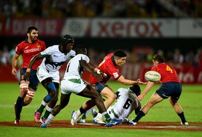 DUBAI, UNITED ARAB EMIRATES - DECEMBER 06: Uri Barrutieta of Spain passes the ball during the match between Spain and Kenya on Day Two of the HSBC World Rugby Sevens Series - Dubai at The Sevens Stadium on December 6, 2019 in Dubai, United Arab Emirates. (Photo by Tom Dulat/Getty Images)