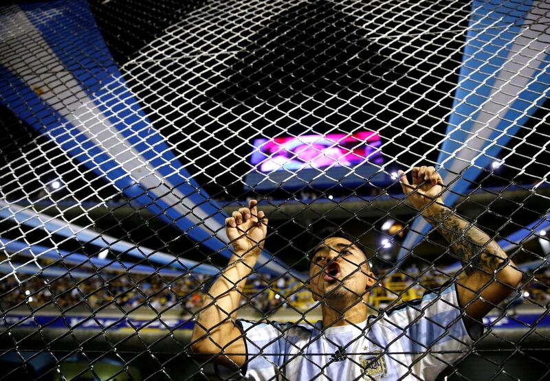 Argentina fans cheer on their team. Marcos Brindicci / Reuters