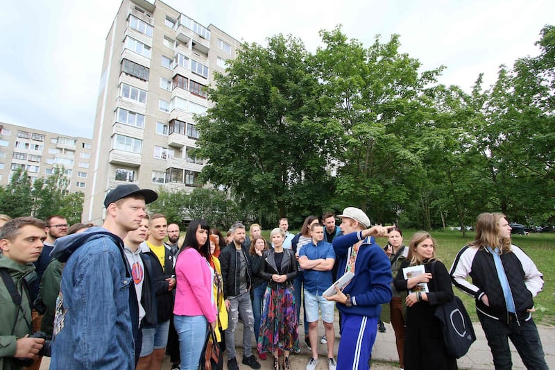 People take part in a guided tour to the places where the HBO series "Chernobyl" was shot in the district Fabijoniskes in Vilnius, Lithuania. All photos by AFP