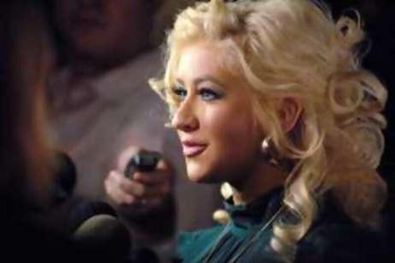 Host Christina Aguilera is interviewed at a Rock the Vote event Tuesday, Nov. 13, 2007 in West Hollywood, Calif. (AP Photo/Phil McCarten)