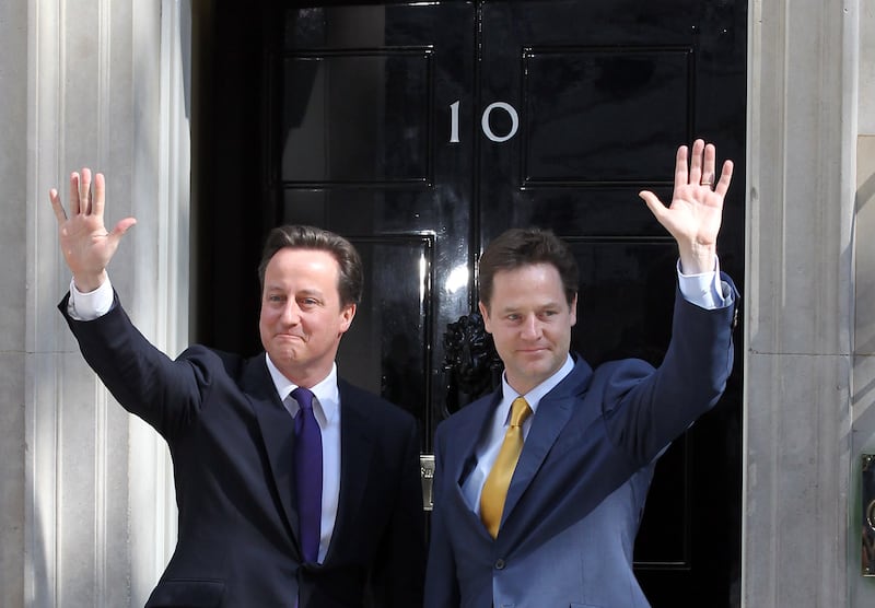 David Cameron with Deputy Prime Minister Nick Clegg on their first day of coalition government on May 2010 in London. Getty Images