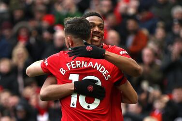 MANCHESTER, ENGLAND - FEBRUARY 23: Anthony Martial of Manchester United celebrates after scoring his team's second goal with teammate Bruno Fernandes during the Premier League match between Manchester United and Watford FC at Old Trafford on February 23, 2020 in Manchester, United Kingdom. (Photo by Clive Brunskill/Getty Images)