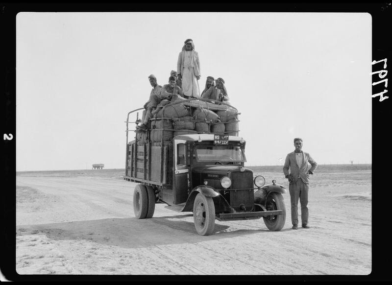 1932: Men on a lorry on the road to Mosul, northern Iraq. AP Photo