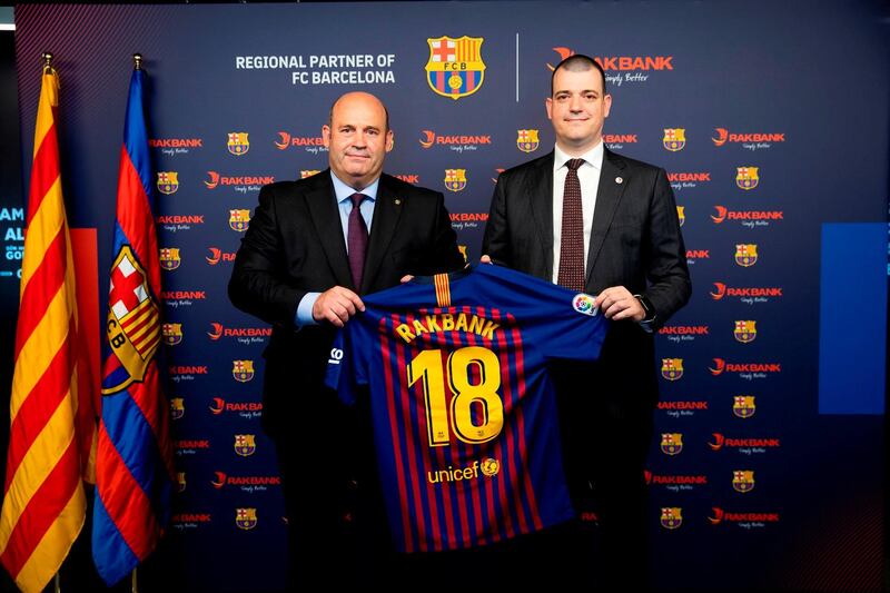 FC Barcelona’s chief executive Òscar Grau and RAKBank’s managing director of personal banking Frederic de Melker at the signing ceremony announcing a strategic regional partnership for 3 years that will see the launch of new FC Barcelona dedicated co-branded products including Mastercard Platinum Credit and Debit Cards. Courtesy: RAKBank