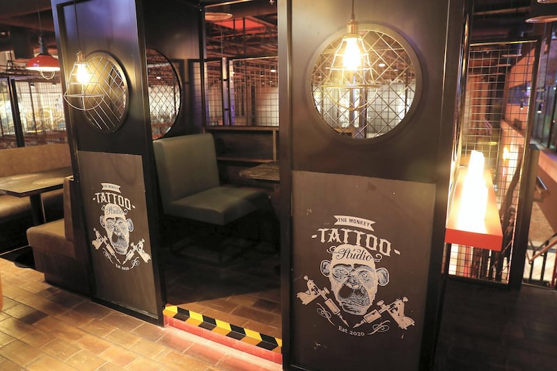 DUBAI, UNITED ARAB EMIRATES , September 27 – 2020 :- View of the tattoo studio at the Brass Monkey, new dining and entertainment destination on the Bluewaters Island in Dubai.  (Pawan Singh / The National) For Lifestyle/Online/Instagram. Story by Janice Rodrigues 