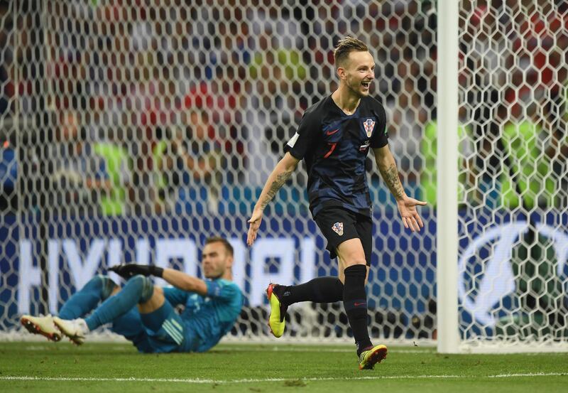 Croatia's Ivan Rakitic celebrates scoring the winning penalty. Shaun Botterill/Getty Images