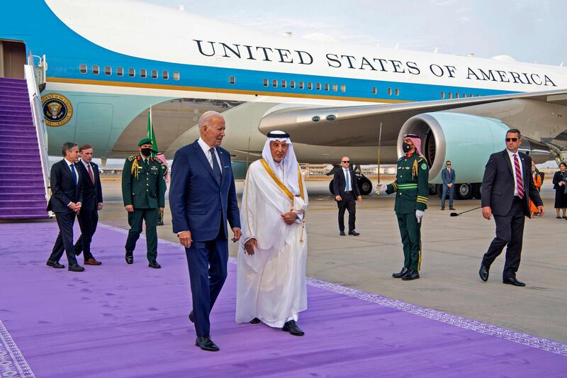 Prince Khaled al-Faisal welcomes US President Joe Biden upon his arrival in Jeddah, July 2022. AFP