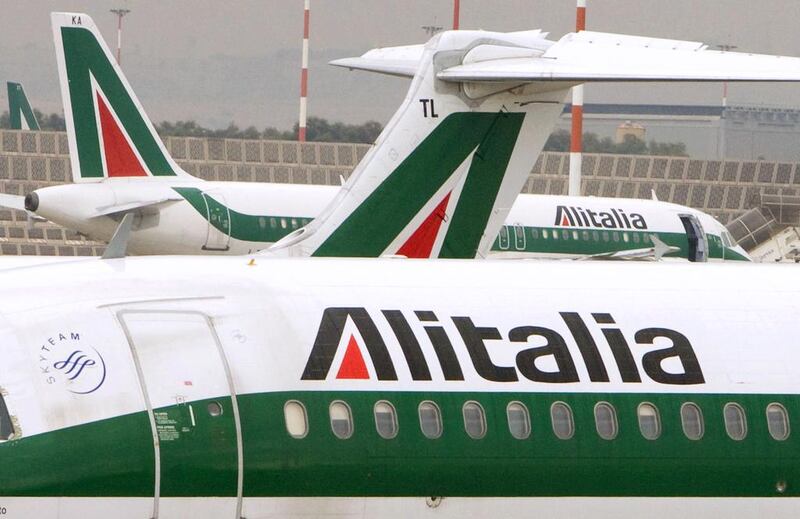 Alitalia airplanes are parked at Fiumicino airport near Rome. Tony Gentile / Reuters