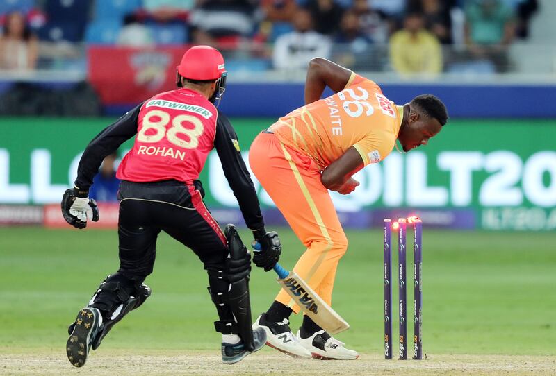 Giants' Carlos Brathwaite breaks the stumps to dismiss Vipers' Rohan Mustafa.