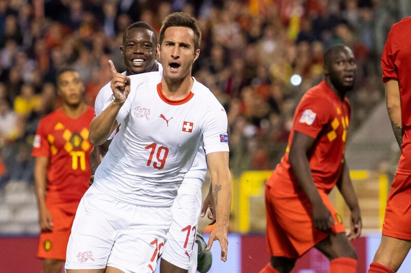 Switzerland's Mario Gavranovic celebrates making it 1-1 against Belgium. EPA