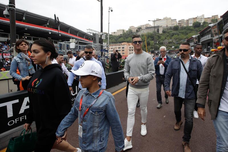 Ronaldo walks down the pit lane in Monaco. AP Photo