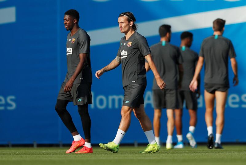 Barcelona's Antoine Griezmann and Ousmane Dembele during training. Reuters