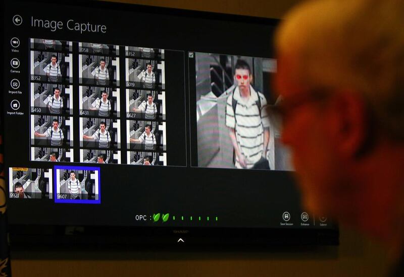 Keith Raderschadt from NEC Corporation of America gives a detailed explanation and demonstration of the new facial recognition software being implemented by the Calgary Police Service at their CPS Headquarters, Westwinds Campus Media Centre in Calgary. Darren Makowichuk / QMI /Corbis