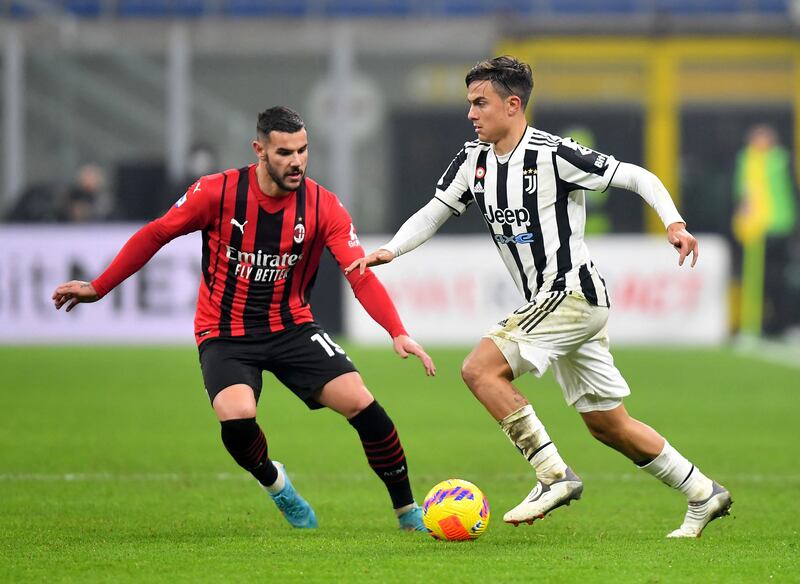 Paulo Dybala takes on Theo Hernandez during the Serie A match between Juventus and AC Milan. Reuters