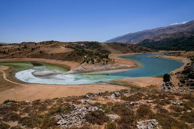 Rubbish gathers in the heavily polluted Litani Rver, in Saghbin, Bekaa valley, eastern Lebanon, June 20, 2021.  AP