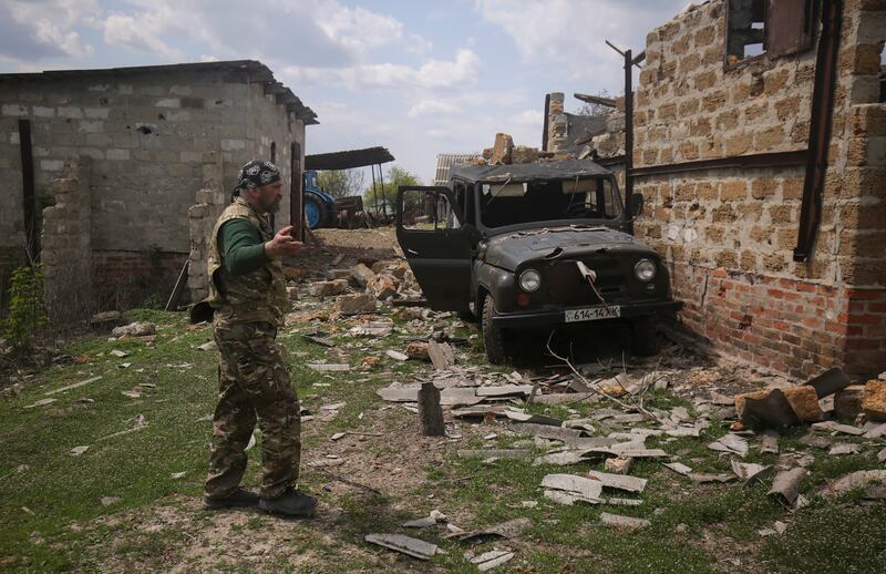 A Ukrainian fighter near the city of Izium in the eastern Donbas region of Ukraine. EPA