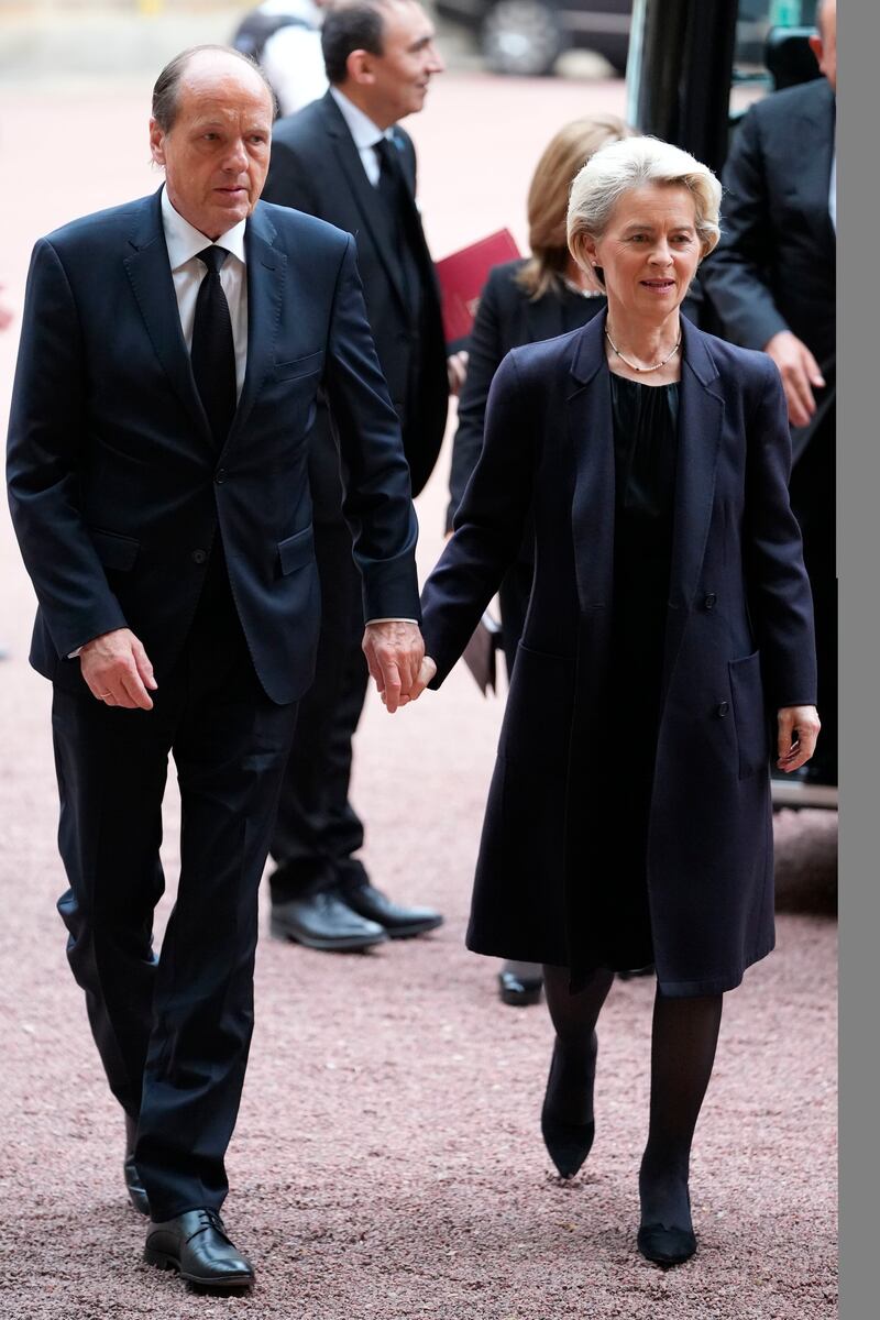 Ursula von der Leyen, President of the European Commission, and husband Heiko arrive for the reception. AP