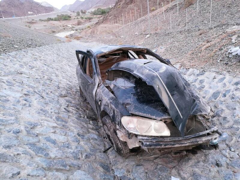 The car smashed through a cement barrier and fell into a valley. Courtesy RAK police