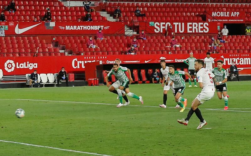 Sevilla's Lucas Ocampos opens the scoring from the penalty spot. Reuters