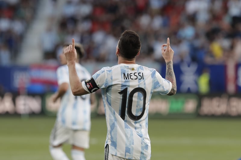 Lionel Messi celebrates after scoring his and Argentina's third goal against Estonia. 