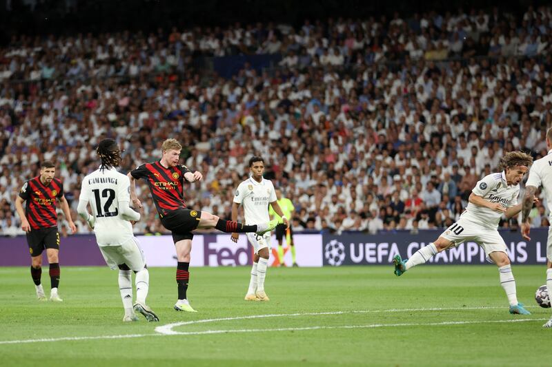 MADRID, SPAIN - MAY 09: Kevin De Bruyne of Manchester City scores the team's first goal during the UEFA Champions League semi-final first leg match between Real Madrid and Manchester City FC at Estadio Santiago Bernabeu on May 09, 2023 in Madrid, Spain. (Photo by Julian Finney / Getty Images)