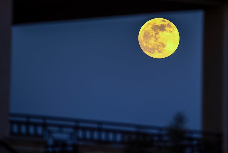 The Super Flower Blood Moon rises over Skopje. EPA