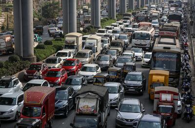 Traffic moves along the busy western express highway in Mumbai in 2021. EPA