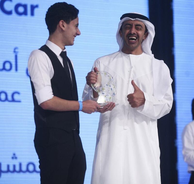 Sheikh Abdullah bin Zayed, Minister of Foreign Affairs, presents a Think Science Competition award to Rami Elmorsi, a Grade 12 pupil at Westminster School. Lee Hoagland / The National