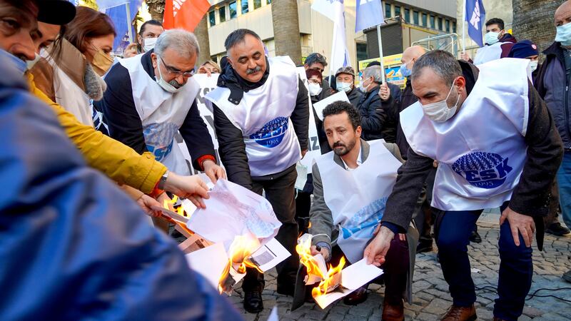 The Izmir Platform of the Confederation of Public Employees Unions protested against the high inflation rate in Turkey and burnt their payslips to highlight the financial difficulties caused by the price of electricity, natural gas, fuel, transport and food. Pacific Press