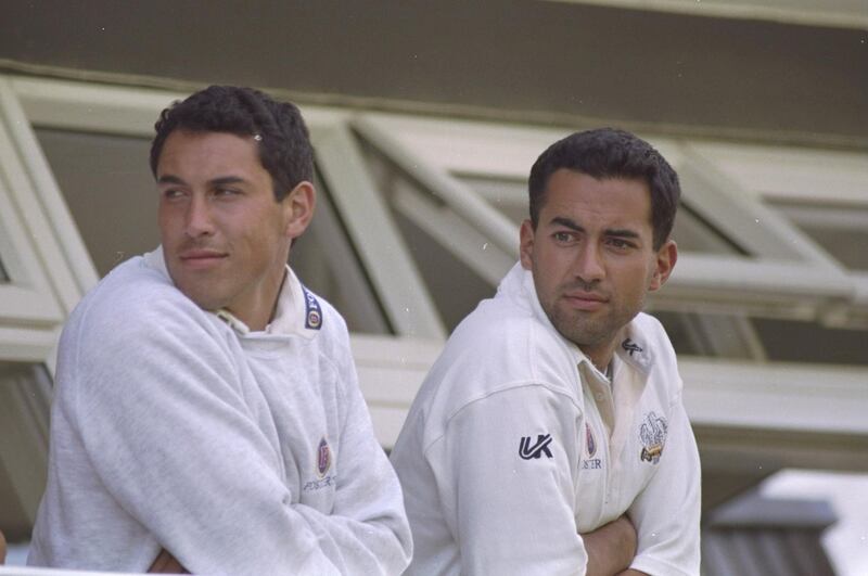 25 May 1997:  Ben (left) and Adam Hollioake of Surrey watch the action from the pavilion balcony during the Benson and Hedges Cup Quarter Final against Essex at Chelmsford County Ground in Essex, England. Surrey won the match. \ Mandatory Credit: LaurenceGriffiths /Allsport