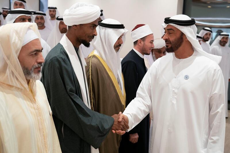 ABU DHABI, UNITED ARAB EMIRATES - May 21, 2018: HH Sheikh Mohamed bin Zayed Al Nahyan Crown Prince of Abu Dhabi Deputy Supreme Commander of the UAE Armed Forces (R), receives a guest of HH Sheikh Khalifa bin Zayed Al Nahyan, President of the UAE and Ruler of Abu Dhabi, prior to a lecture by Omar Habtoor Al Darei titled "Reclaiming Religion In The Age of Extremism", at Majlis Mohamed bin Zayed. 

( Hamad Al Kaabi / Crown Prince Court - Abu Dhabi )
---